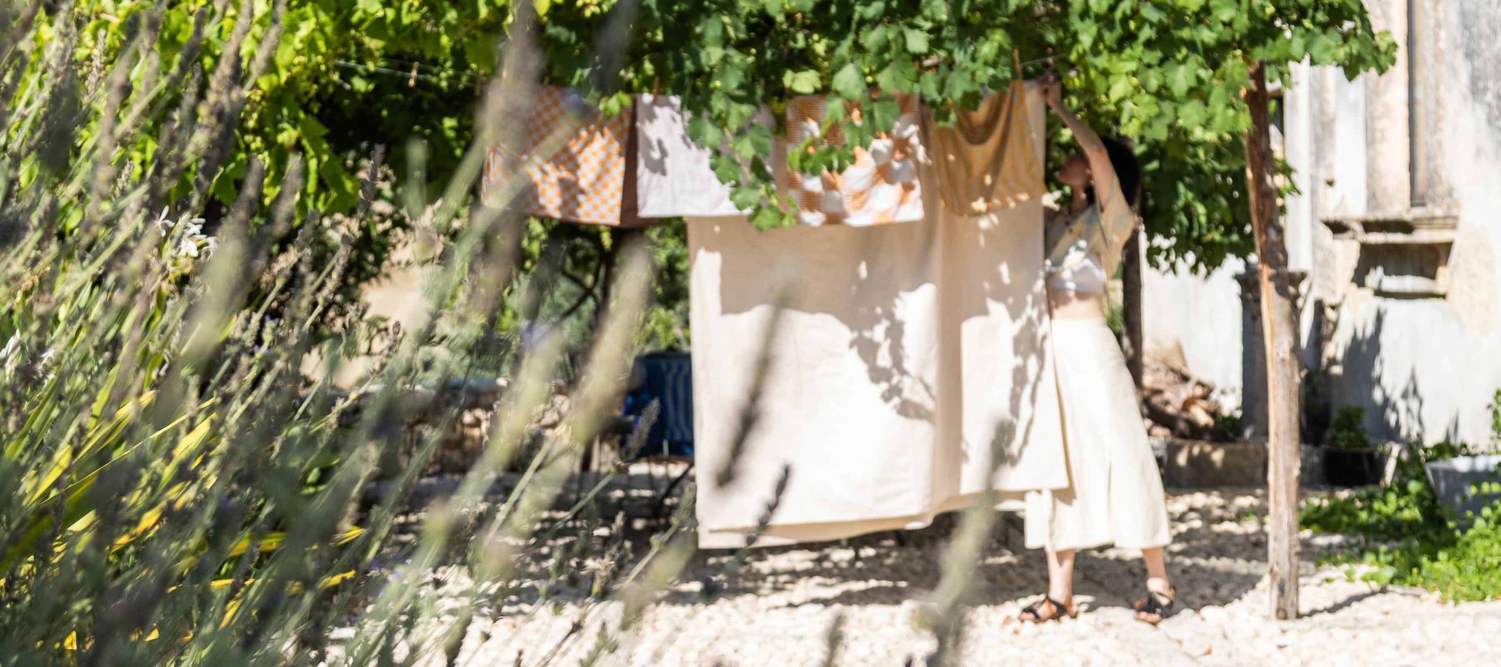 Hang dried table linens in the Italian sun